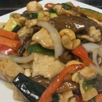 Chicken & Cashew Nuts · Wok-tossed chicken, carrots, zucchini shiitake mushrooms, red bell pepper and cashew nuts wo...