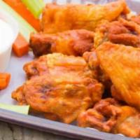 Classic Bone In Wings (10) · Ten Traditional Wings tossed in our Signature Sauces with Carrots, Celery and One Dipping Sa...