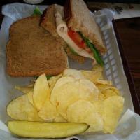 Turkey and Avocado Sandwich · Turkey (COLD), Avocado, Swiss Cheese, Lettuce and Tomato on Sliced Wheat.  Served with Pickl...