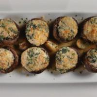 Stuffed Mushrooms · mushroom caps filled with sausage, goat cheese, ricotta + spinach, mediterranean vinaigrette