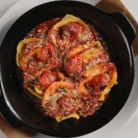 Pomodoro Tortellacci · tortellacci stuffed with four-cheese blend, imported pomodorina, charred tomato