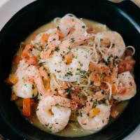 SHRIMP SCAMPI · sautéed jumbo shrimp, rosemary garlic butter, lemon juice, diced roma tomatoes, capellini pa...