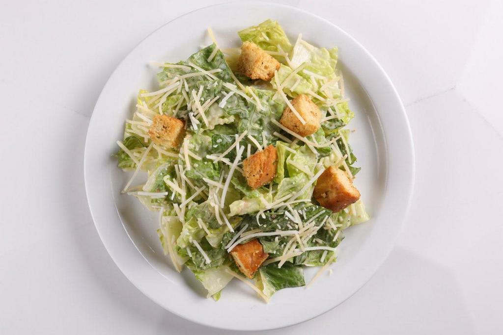 Caesar Salad Side · romaine, romano, creamy caesar dressing, rustic croutons