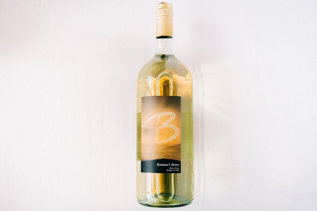 House White Wine | Romano'S Bianco  · 1.5L | Italy | Romano's Bianco is a delicate blend with bright flavors of apples and hints of tropical fruits. The overall rich mouthfeel combines mineral notes with a touch of sweetness and balanced acidity.