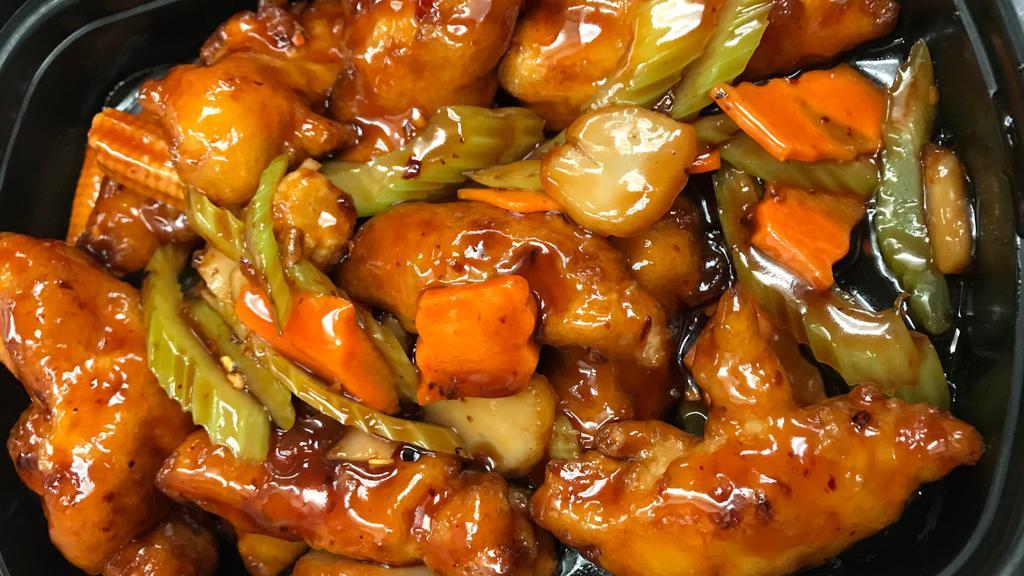 Orange Chicken 陈皮鸡 · Spicy. Sliced chicken with red peppers, baby corn, celery, and water chestnuts in a  special orange sauce.