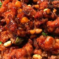 Kung Pao Chicken 宫保鸡 · Spicy. Our famous diced chicken with spring onions, water chestnuts, and peanuts in our spec...