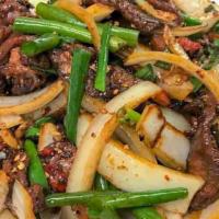 Mongolian Beef · Wok Tossed Beef, Onions, & Scallion with Spicy Mongolian Sauce.