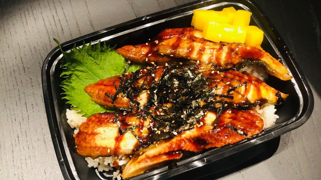 Unagi Don · BBQ eel, rice and unagi sauce.