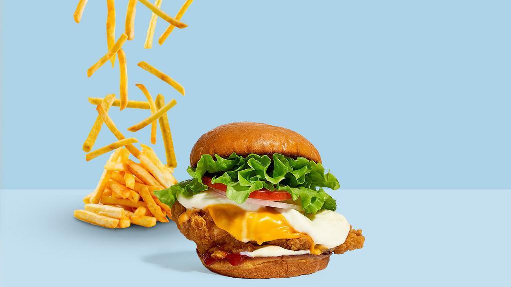 Keep It Cheesin' Sandwich  · Crispy fried chicken, cheddar, mozzarella, lettuce, tomato, mayo, and ketchup served on a griddled brioche bun.