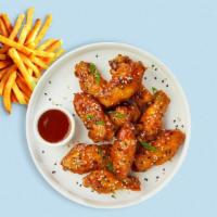 Miss Sweet Tang Wings · Fresh chicken wings breaded, fried until golden brown, and tossed in sweet chili sauce.