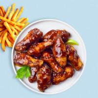 BBQ Bros Wings  · Fresh chicken wings breaded, fried until golden brown, and tossed in barbecue sauce.