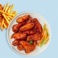 Hot As Cluck Wings  · Fresh chicken wings breaded, fried until golden brown, and tossed in hot sauce.