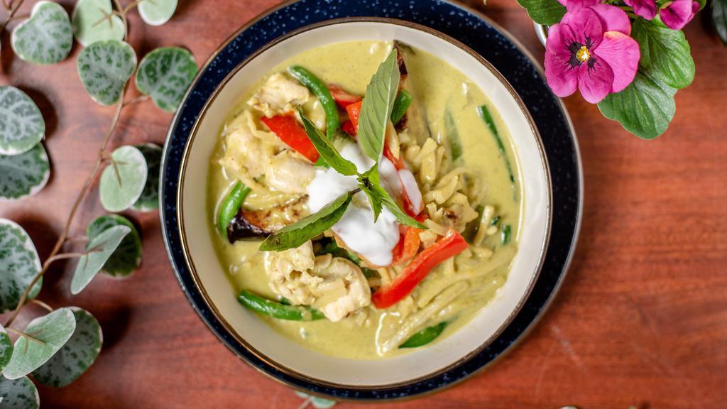 Green Curry · String bean, eggplant, bamboo shoot, bell pepper and sweet basil with coconut milk.