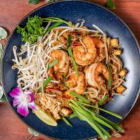 Pad Thai · Stir-fried thin rice noodle with tamarind sauce, tofu, egg, red onion, bean sprout, crushed ...