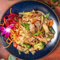 Pad Kee Mao · Stir-fried flat rice noodle with chili, onion, green bean, mushroom, bell pepper, tomato, ba...