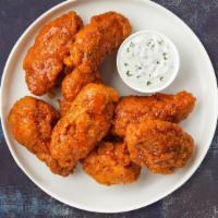 Mango Tango Habanero Wings · Fresh chicken wings breaded and fried until golden brown and tossed in mango habanero sauce....