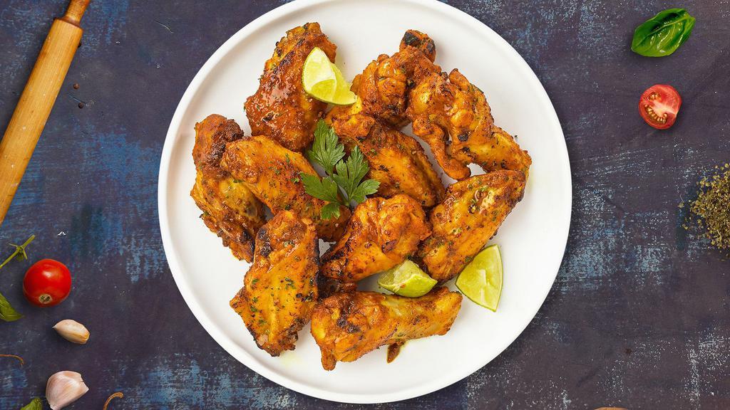 Lemon Pepper Wings · Fresh chicken wings breaded and fried until golden brown and tossed in lemon pepper sauce. Served with a side of ranch or bleu cheese.