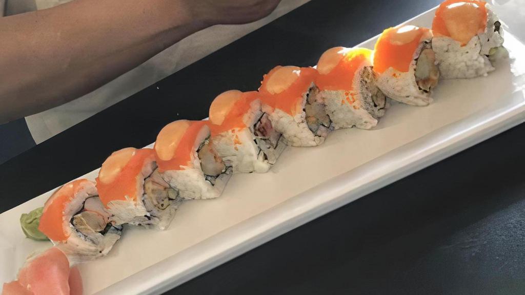 California Supreme · Non-raw rolls. Inside: shrimp tempura, cucumber, imitation crab top: masago garnish: creamy sauce