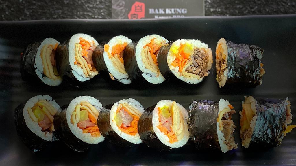 Bulgogi Kimbap  · Comes with two rolls cut into bite sizes. Marinated Bulgogi, radish, carrots, fish cake, and touch of sesame oil.
