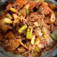 Garlic Pork Belly Rice Bowl 蒜蓉猪五花盖饭 · Stir fired garlic pork belly with onion over rice.