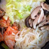 Bibim Bap 石锅拌饭 · Vegetarian if no added side. May add choice of protein and egg. Steamed rice topped with bea...