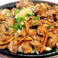 Spicy Chicken (Individual) 一人食 · Asian style BBQ chicken marinated in spicy sauce. Comes with one rice and side dishes. A com...