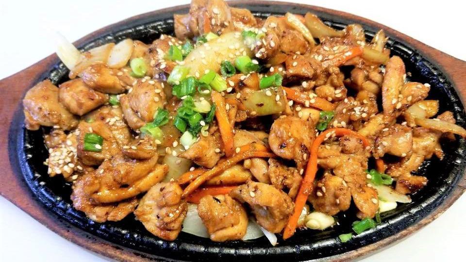 Spicy Chicken (Individual) 一人食 · Asian style BBQ chicken marinated in spicy sauce. Comes with one rice and side dishes. A complete meal for one person.