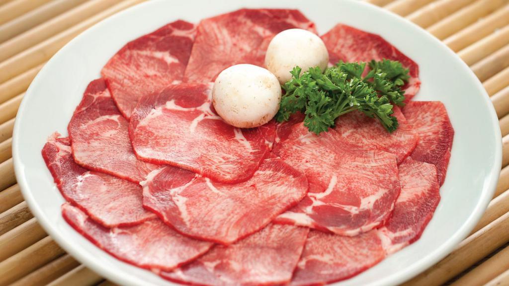 Beef Tongue (1/2 lb)(Uncooked) 生 半磅 · Sliced beef tongue