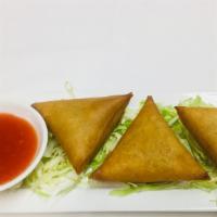 Burmese Samusas (3 Pieces) · Hot and spicy. Burmese raviolis filled with curry spices and potatoes.