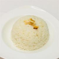 Coconut Rice (Per Person) · Jasmine rice cooked with coconut milk.