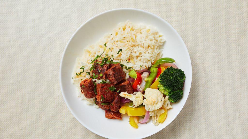 GF Beyond Rice Bowl (V) · Jasmine rice with gluten free orzo, Beyond (plant-based) meatballs and roasted seasonal vegetables (bell peppers, broccoli, cauliflower). Served with hot sauce. Gluten-free. Vegan.