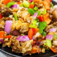 Sisig · Marinated Pork Belly served with Green Peppers, Red Peppers and Red Onions.