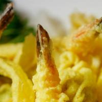 Tempura · 2 pieces shrimp tempura and vegetables.