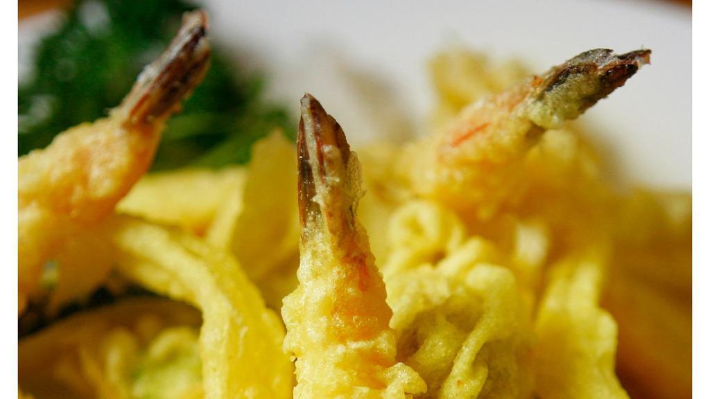 Tempura · 2 pieces shrimp tempura and vegetables.