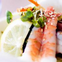 Seafood Sunomono · Assorted seafood and cucumber marinated with vinegar dressing.