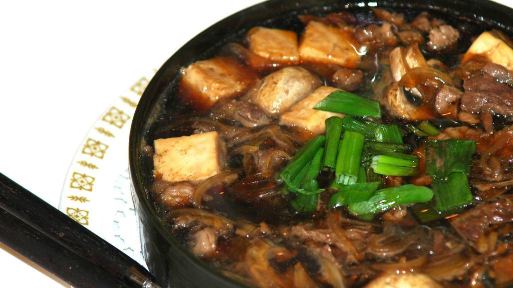 Beef Sukiyaki · Beef stew with noodle and vegetables in sweet and soy sauce.