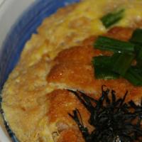 Katsu Donburi · Pork cutlet and eggs over rice.