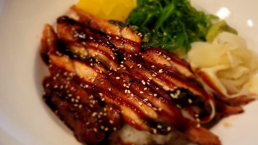Unagi Donburi · Grilled fresh water eel over rice.