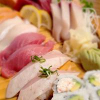 Azuma Deluxe · 9 pieces of sashimi, 8 pieces of nigiri and 6 pieces of California roll for two.