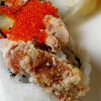6. Spider Roll · Fried soft shell crab, crab meat, avocado, gobo, cucumber, and fish roe.