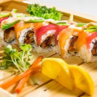 1. Playboy Roll · Shrimp tempura, spicy tuna, gobo topped with salmon, tuna, and jalapeño.