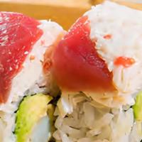4. Candy Cane Roll · Shrimp tempura and avocado topped with tuna and crab meat.