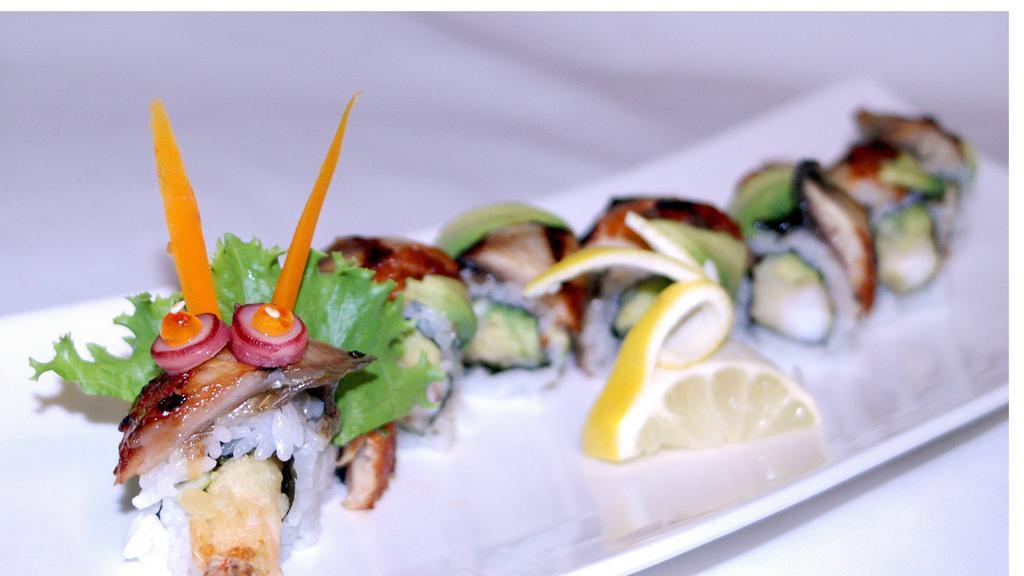 4. Dragon Roll · Shrimp tempura, crab meat, and cucumber topped with eel and avocado.