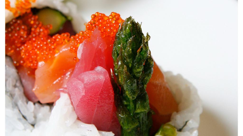 2. Crazy Mikado Roll · Chef's choice of assorted sashimi and asparagus topped with flying fish roe.