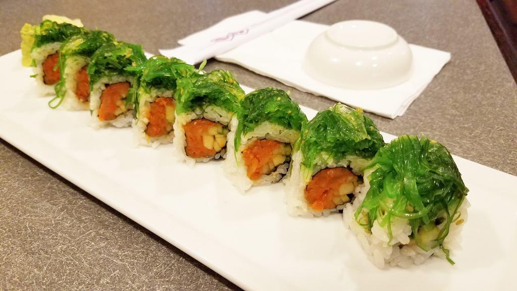 2. Jungle Roll · Spicy tuna and cucumber roll topped with seaweed salad.