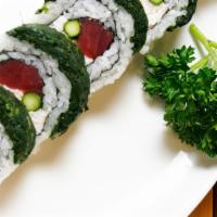 4. North Beach Roll · Tuna, crab meat and asparagus topped with spinach.