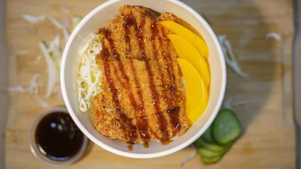 Pork katsu rice  · Deep-fried pork cutlet w/ katsu sauce over rice, pickle radish