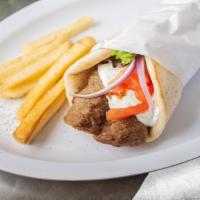 Gyros 7 Inch · Lamb & beef with tzatziki sauce. Gyros is dish of meat roasted on a vertical spit. It is usu...