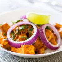Chilli Paneer (Vegetarian) · Battered fried cottage cheese sautéed in spices, chili and herbs.