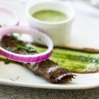 Lamb Seekh Kabab · Ground lamb marinated with mint, cilantro leaves, onions and  special spices, rolled on skew...